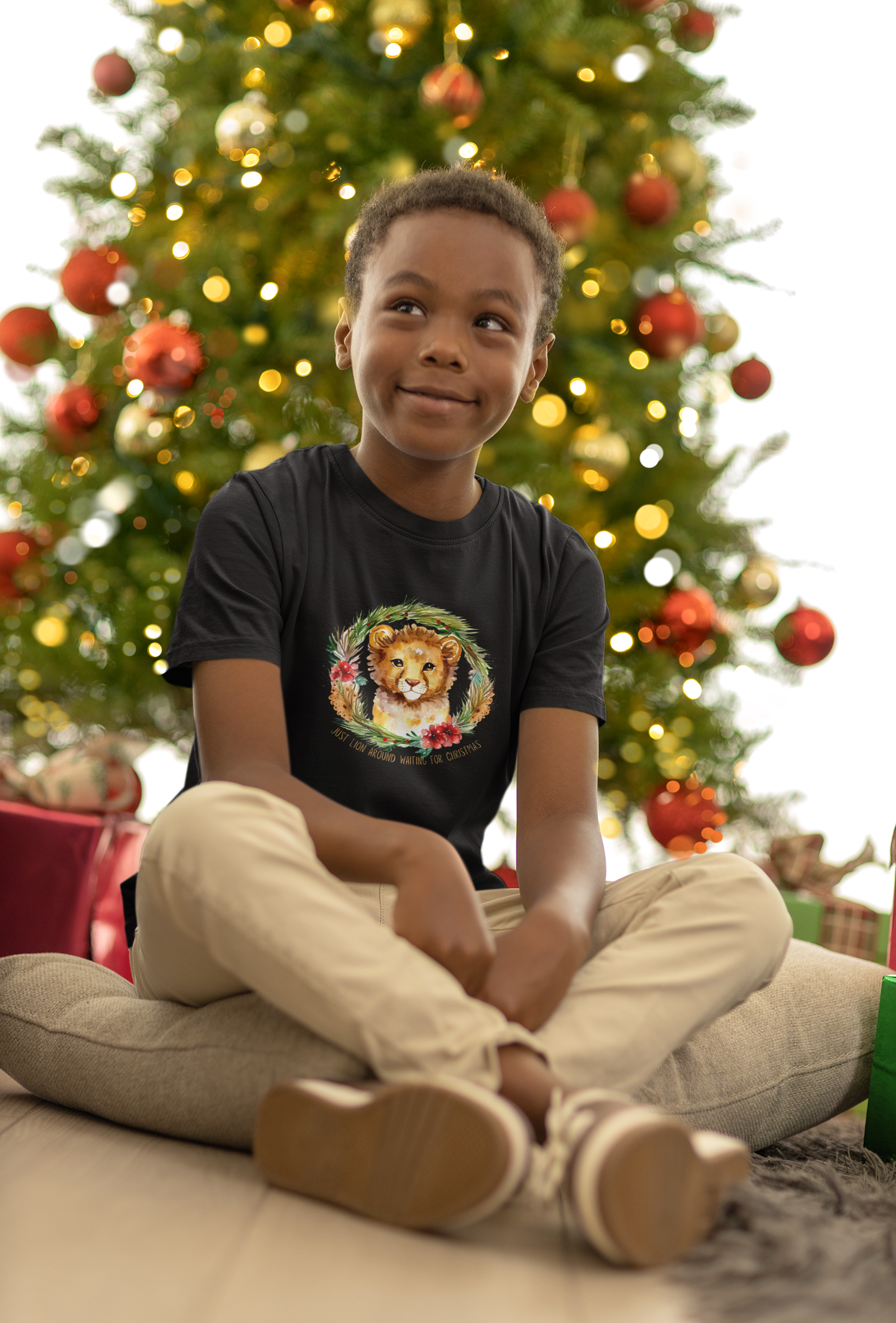 Roar Into the Holiday Season with this Lion-themed Youth Short Sleeve Tee