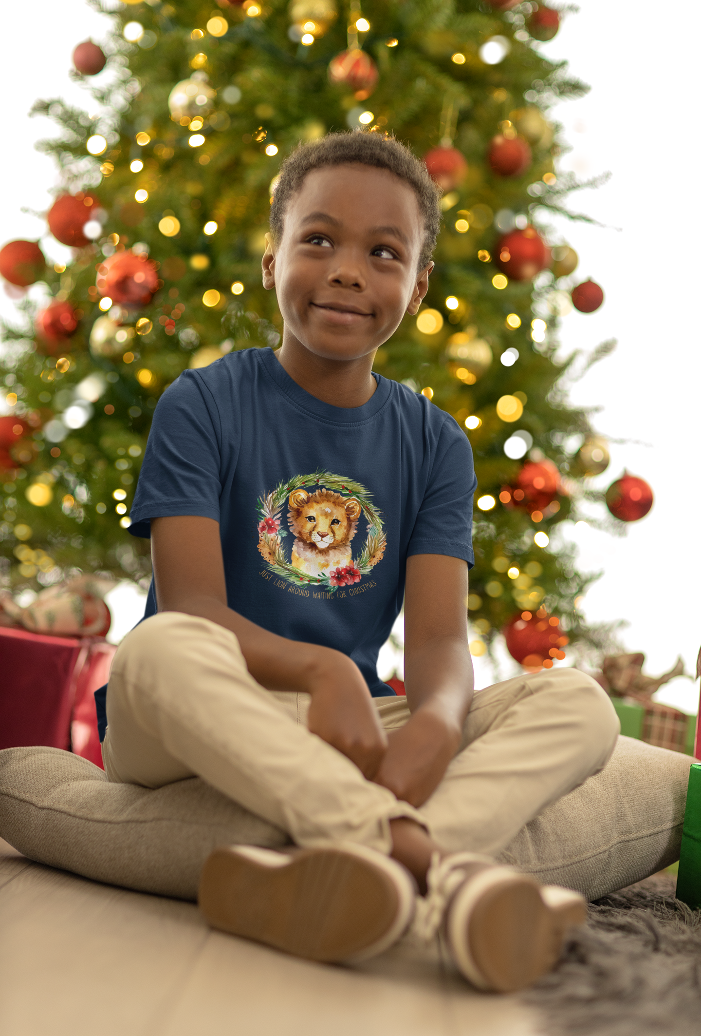 Roar Into the Holiday Season with this Lion-themed Youth Short Sleeve Tee