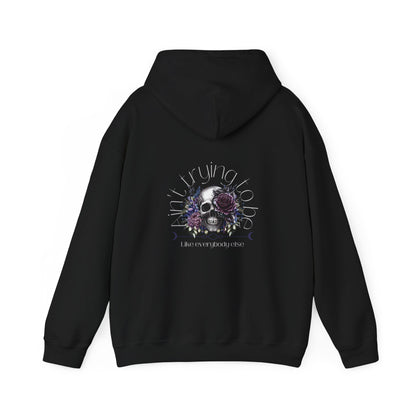 Make a statement with our Aint Trying Unisex Heavy Blend™ Hooded Sweatshirt in various colors